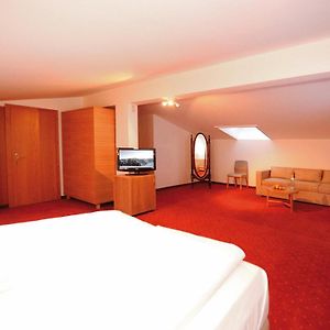 Suite met een Queen Size Bed